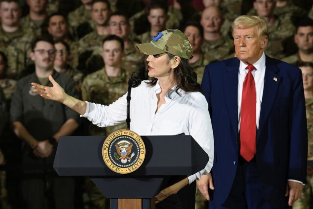 1080px-Michigan_Governor_Gretchen_Whitmer_delivers_remarks_during_a_press_briefing_at_Selfridge_Air_National_Guard_Base